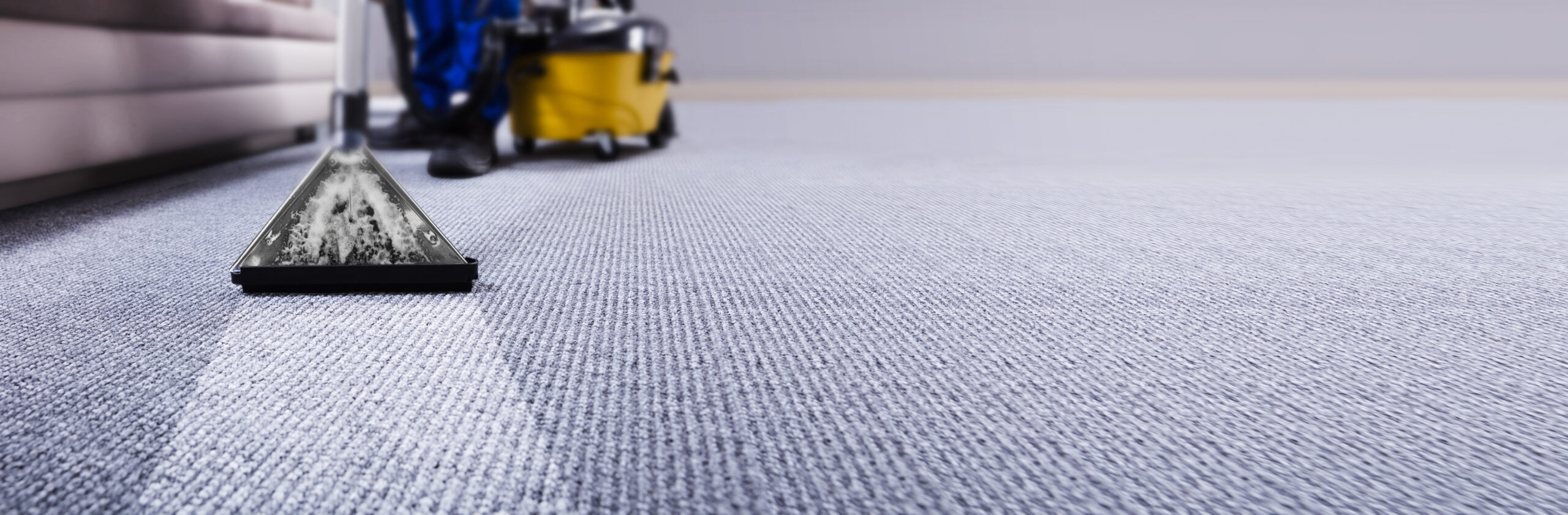 Janitor Cleaning Carpet